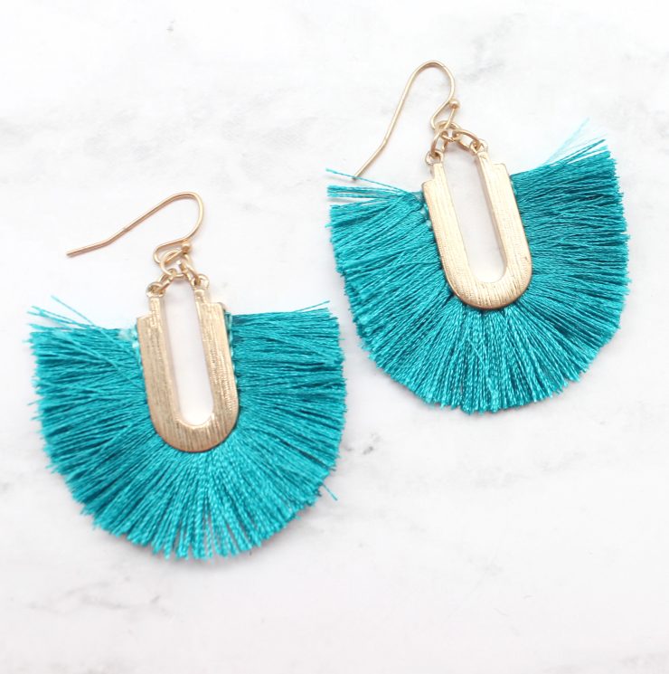 A photo of the Frilly Fringe Earrings product