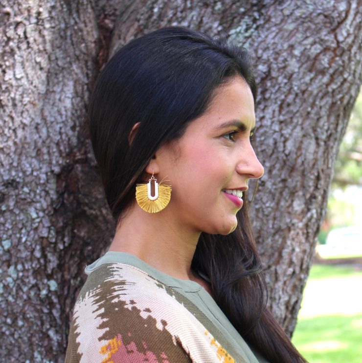 A photo of the Frilly Fringe Earrings product