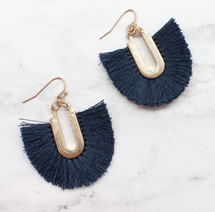 A photo of the Frilly Fringe Earrings product