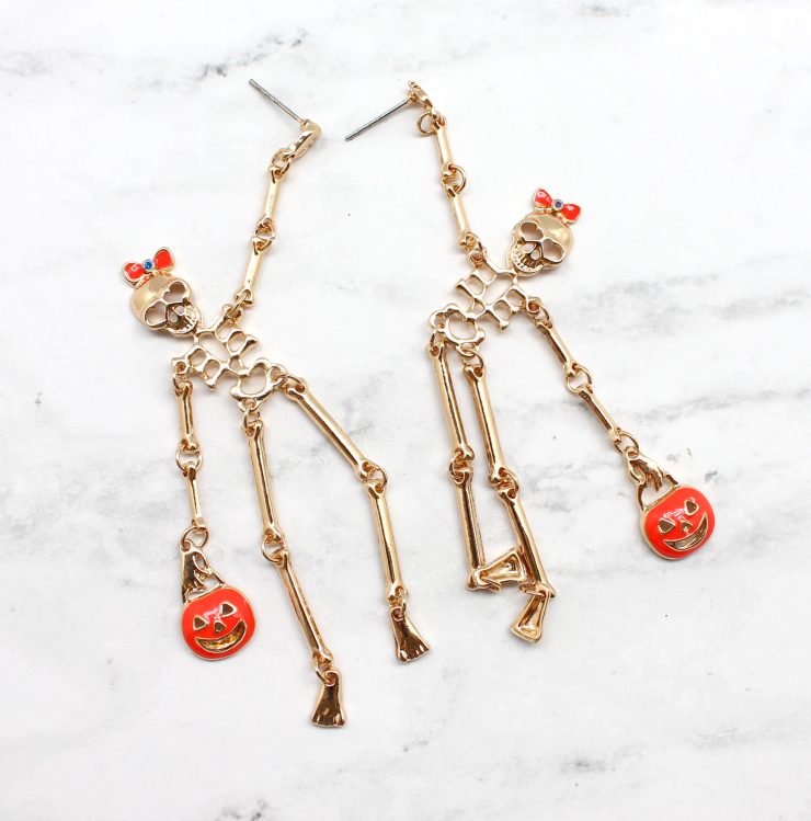 A photo of the Skeleton Earrings In Gold product