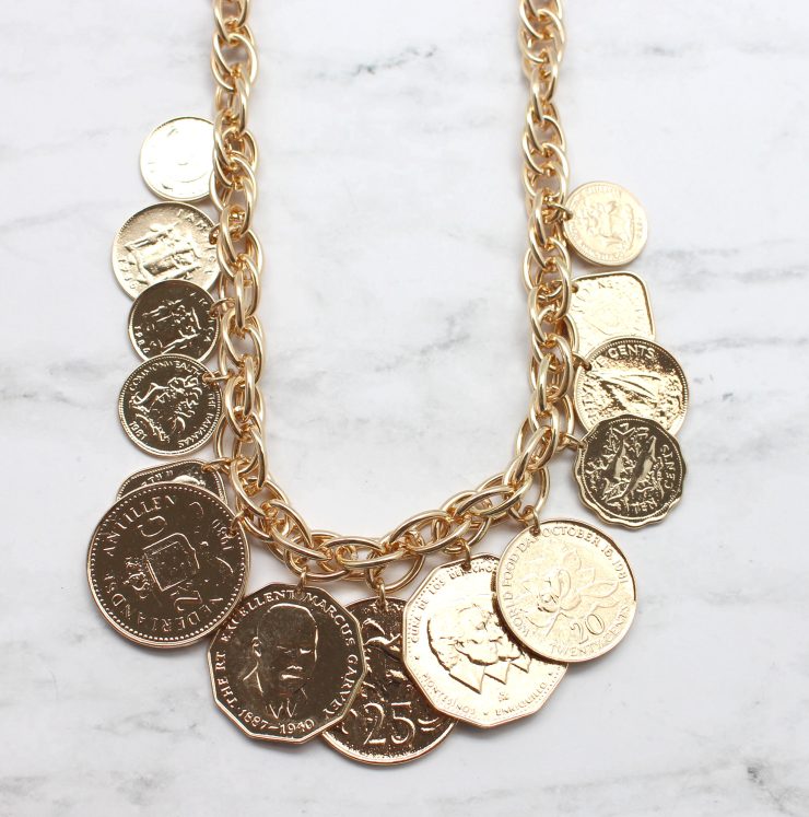 A photo of the It Makes Cents Necklace product