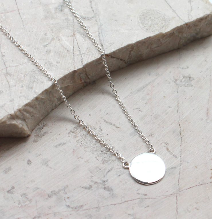 A photo of the Silver Stamp Necklace product