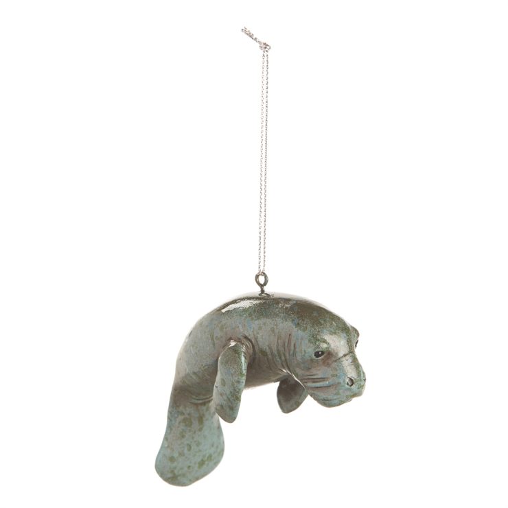 A photo of the Swimming Manatee Ornament product