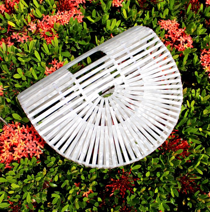 A photo of the The Basket Clutch product