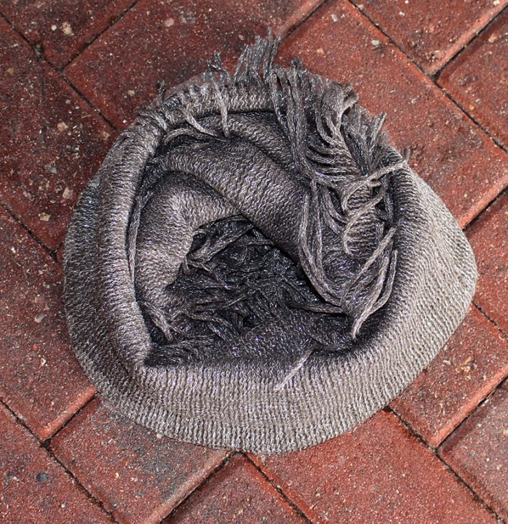 A photo of the The Dallas Infinity Scarf product