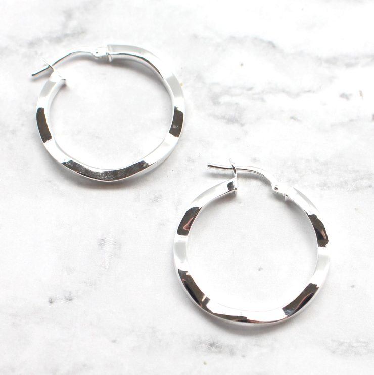 A photo of the The Fiona Earrings product