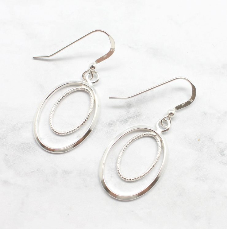 A photo of the The Hawthorn Earrings product