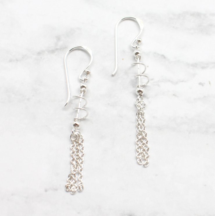 A photo of the The Hemlock Earrings product