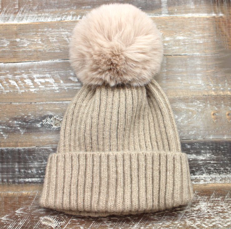 A photo of the The Regina Pom Pom Hat product