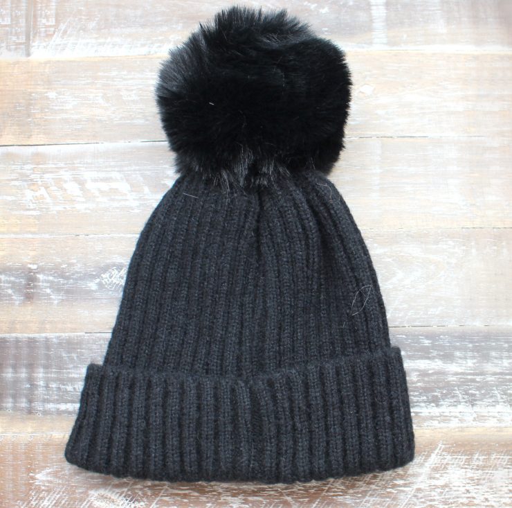 A photo of the The Regina Pom Pom Hat product