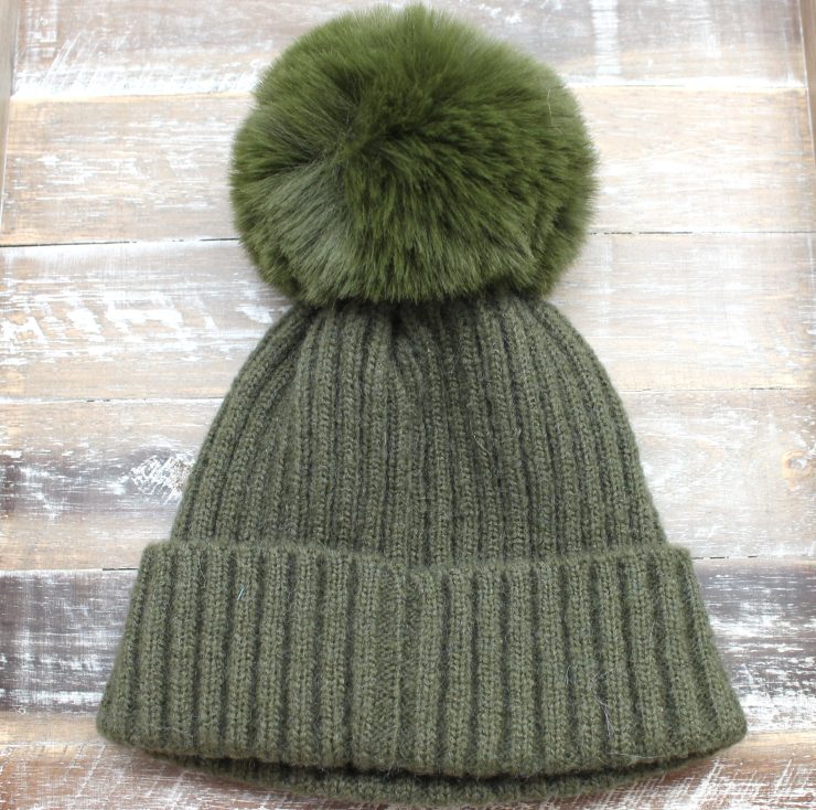 A photo of the The Regina Pom Pom Hat product