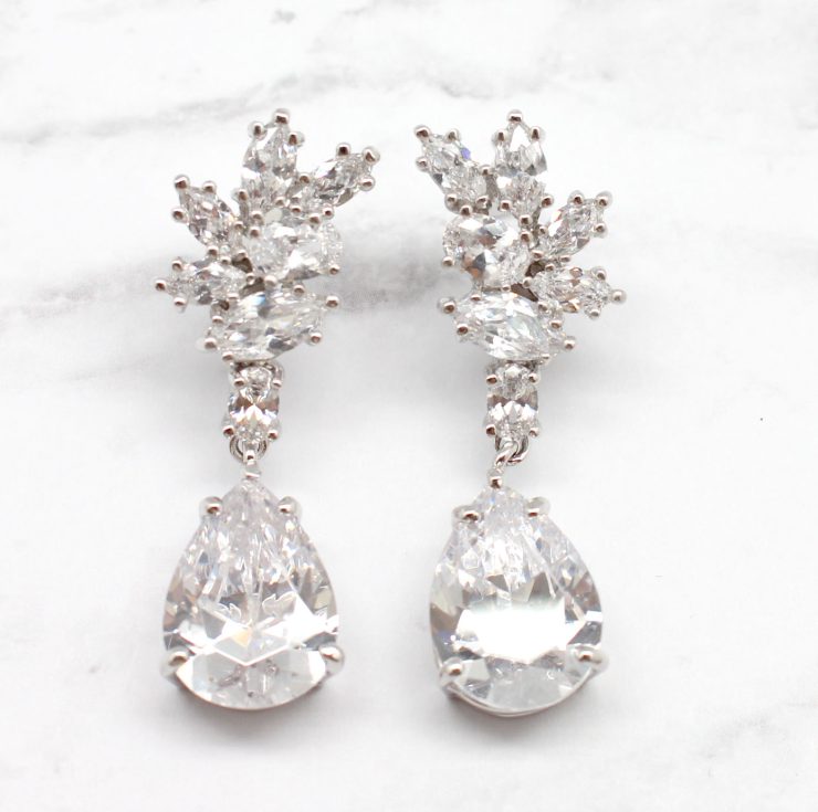 A photo of the Two Peas In A Pod Earring product