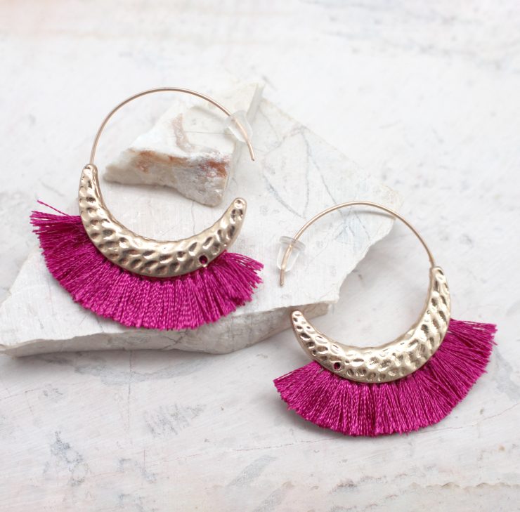 A photo of the All The Fringe Earrings product