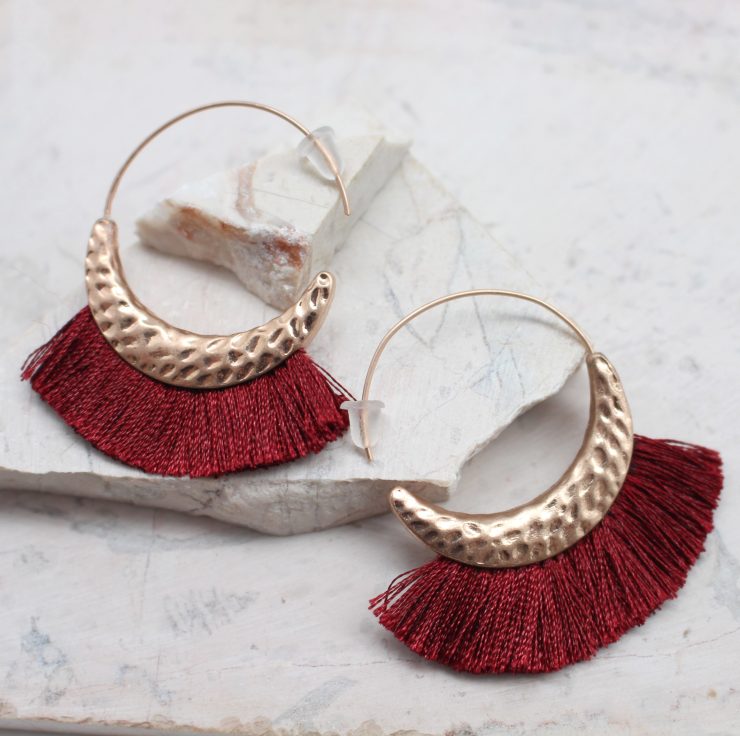 A photo of the All The Fringe Earrings product