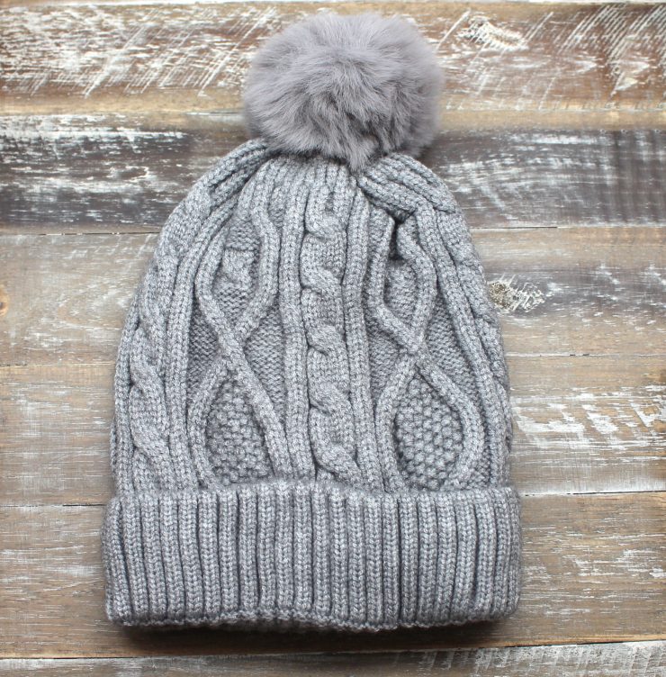 A photo of the Crochet Pom Pom Kids Beanie product