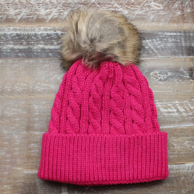 A photo of the Crochet Pom Pom Kids Beanie product