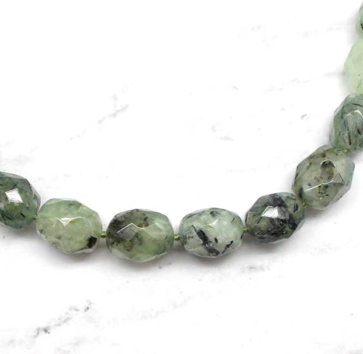 A photo of the Going Green Necklace product