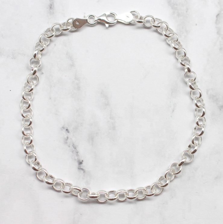 A photo of the Hopeful Hoop Anklet product