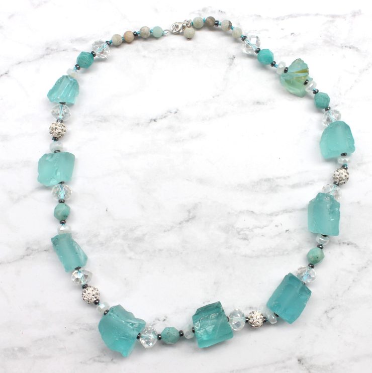 A photo of the Never Blue Necklace product