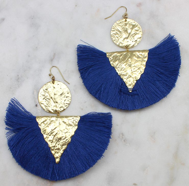 A photo of the On The Verge Earrings product