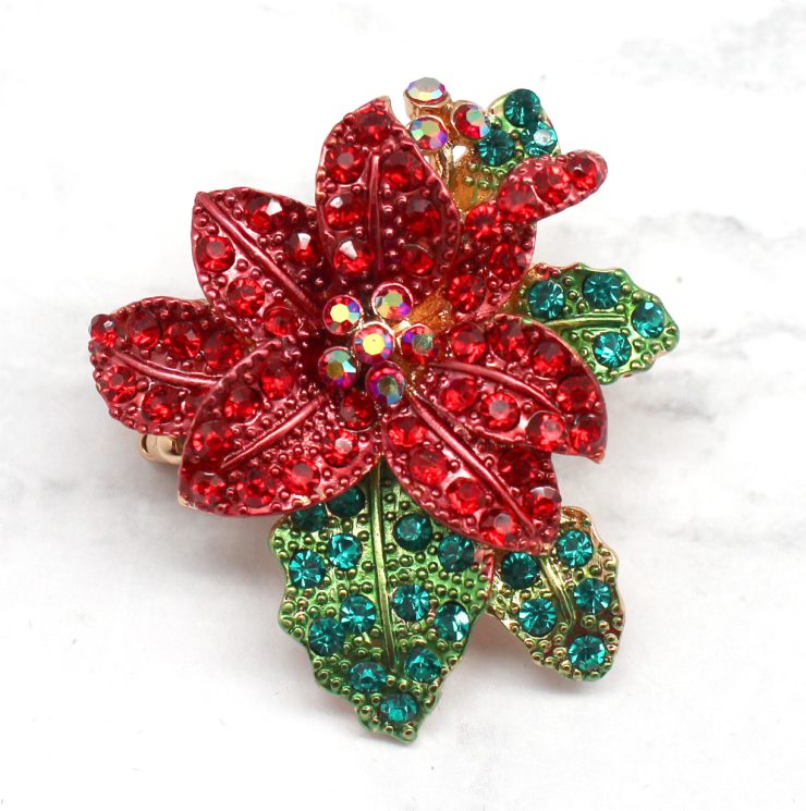 A photo of the Pretty Poinsettia Plant Stretch Ring product