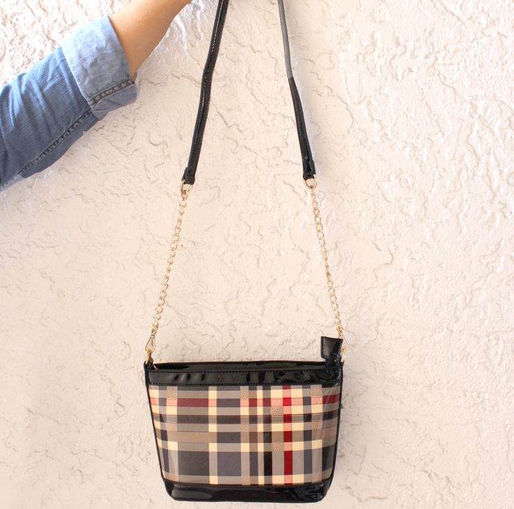 A photo of the Prim Plaid Cross Body Bag product