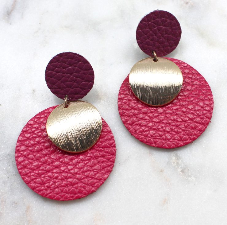 A photo of the Right On The Button Earrings product
