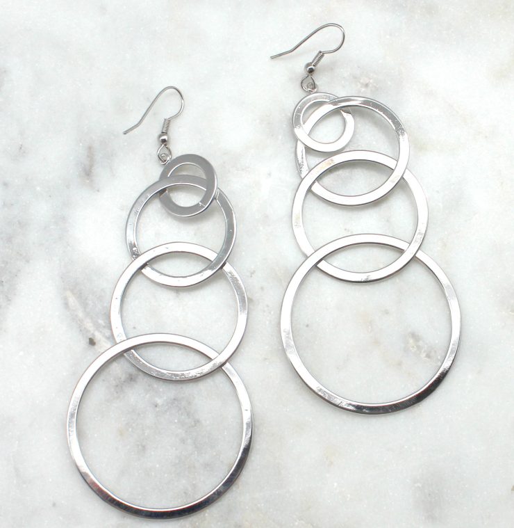 A photo of the Ring Around The Rosie Earrings product
