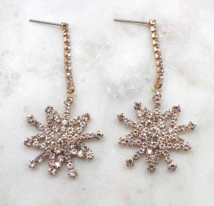 A photo of the Shivering Snowflake Earrings product