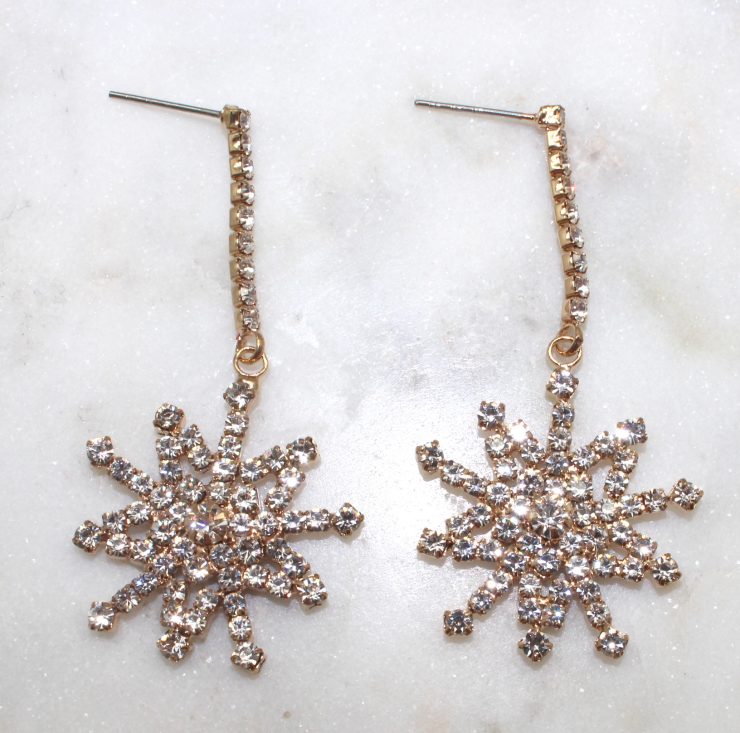 A photo of the Shivering Snowflake Earrings product