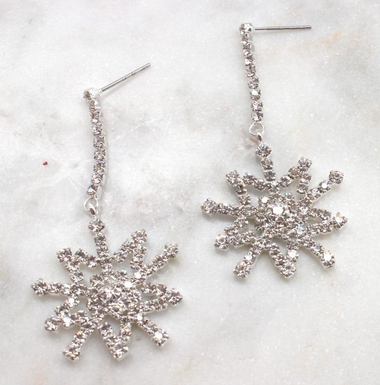 A photo of the Shivering Snowflake Earrings product