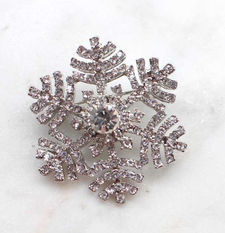 A photo of the Snowflake Hills Pin product
