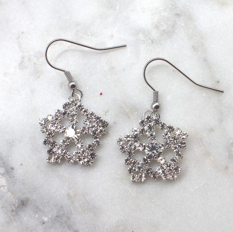 A photo of the Soft Snowflakes Earrings product