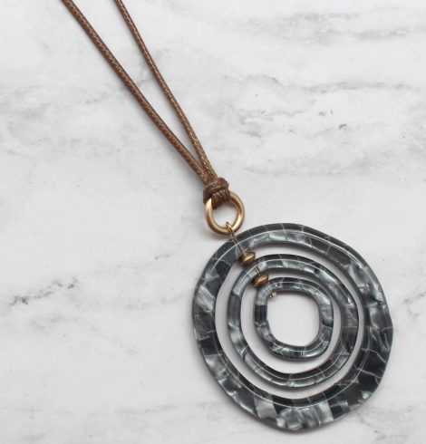 A photo of the Spin The Dial Necklace product