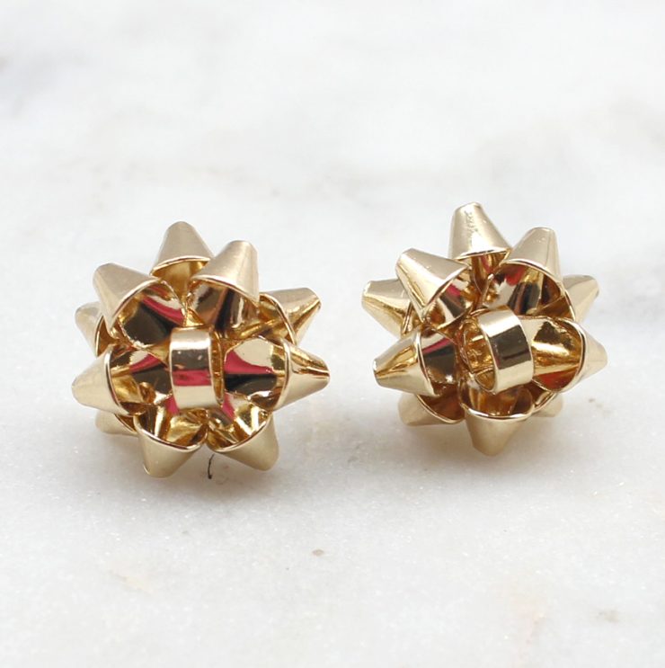 A photo of the Christmas Bow Stud Earrings product