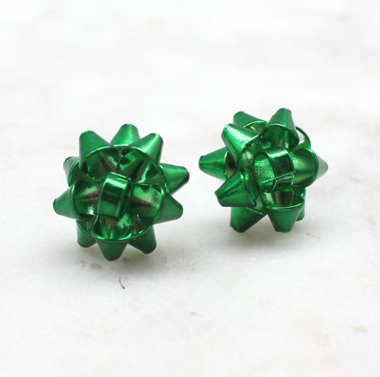 A photo of the Christmas Bow Stud Earrings product