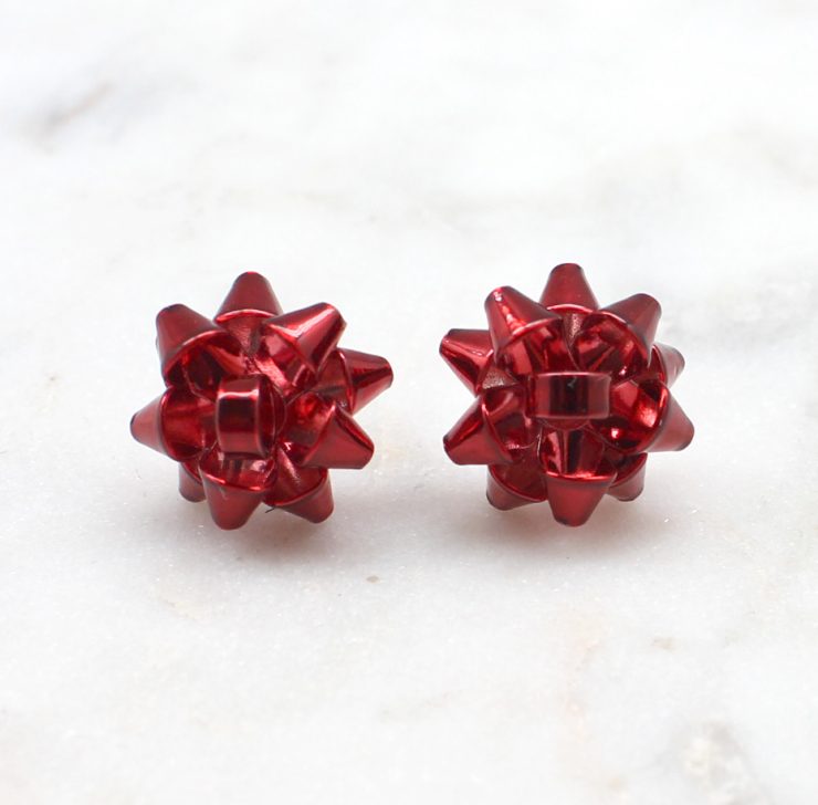 A photo of the Christmas Bow Stud Earrings product