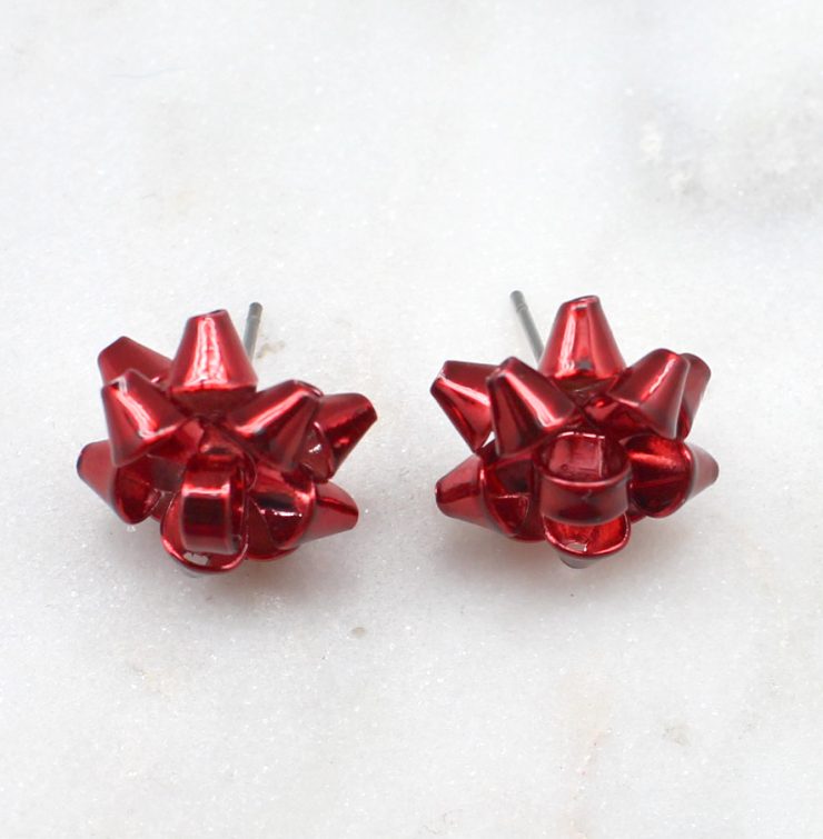 A photo of the Christmas Bow Stud Earrings product