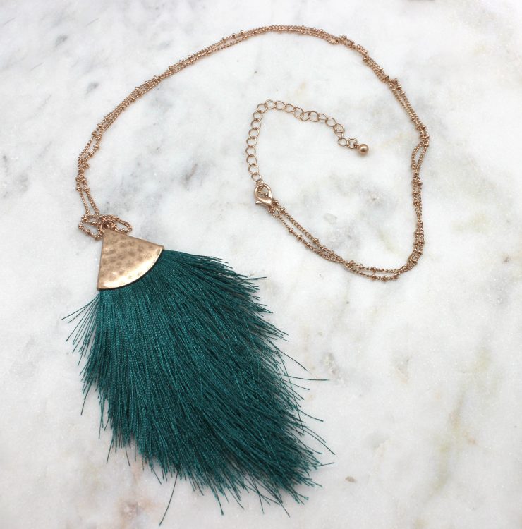 A photo of the Tassel Me Necklace product