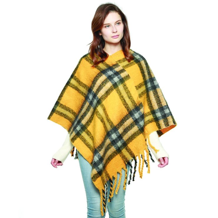 A photo of the The Jordyn Poncho product