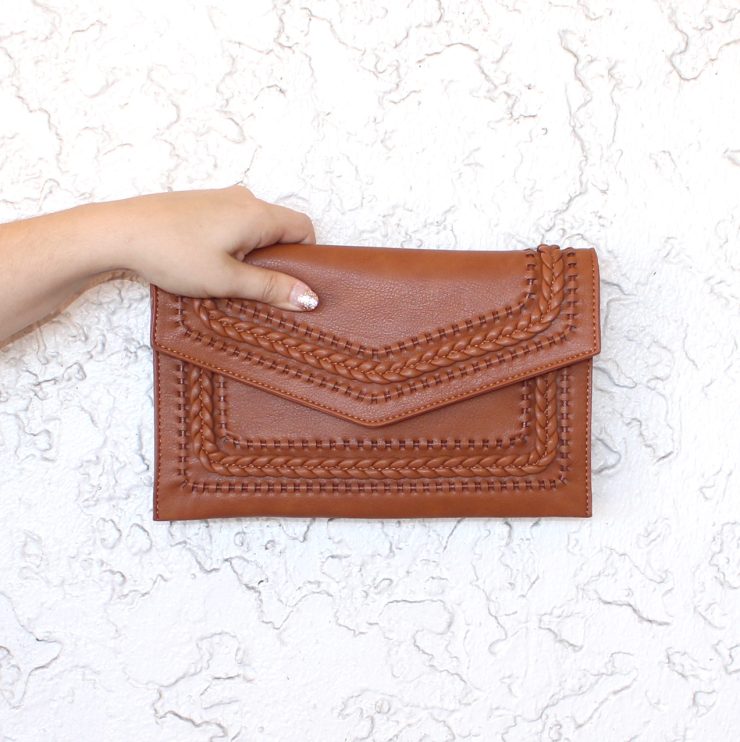 A photo of the Wandering Soul Cross Body Clutch product