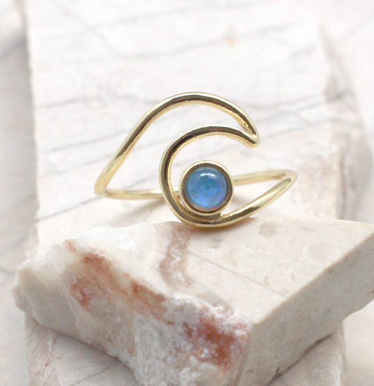 A photo of the Wave Ring With Opal Stone product