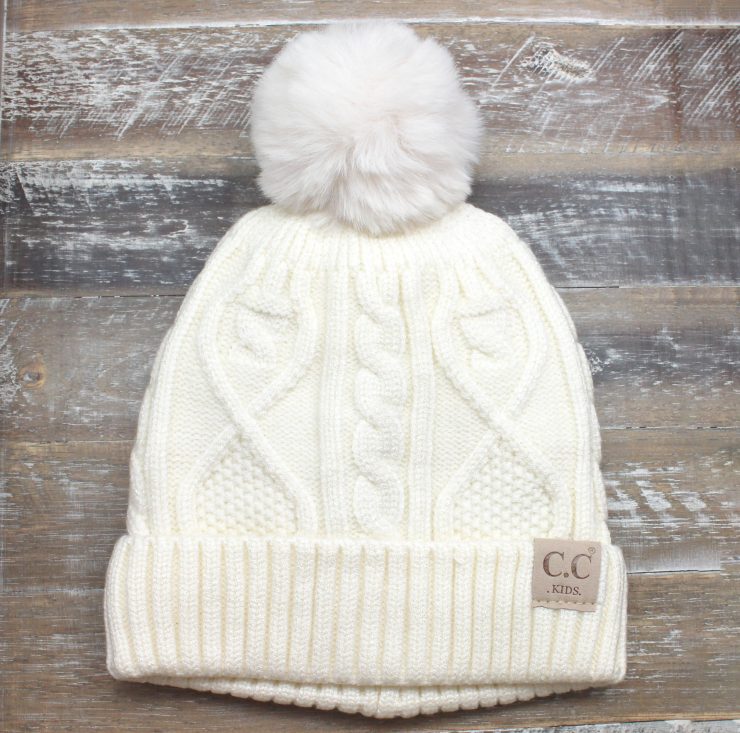 A photo of the Kids Pom Beanie product