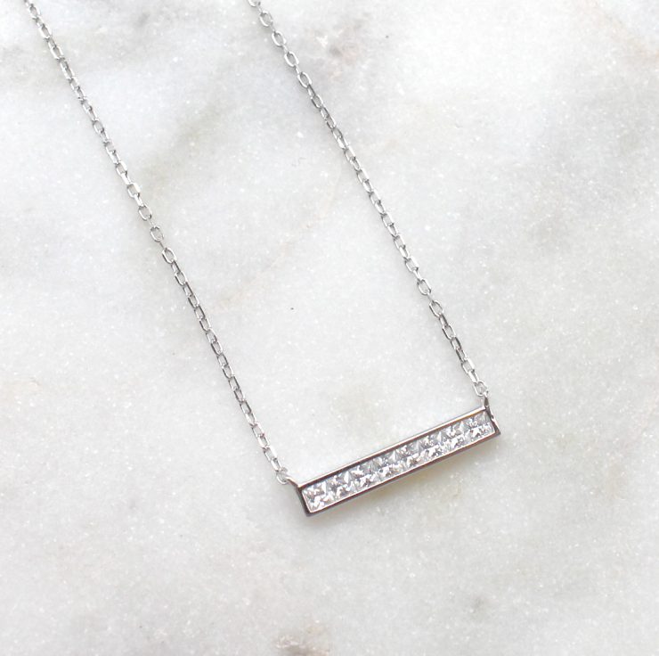 A photo of the Meet The Bar Necklace product