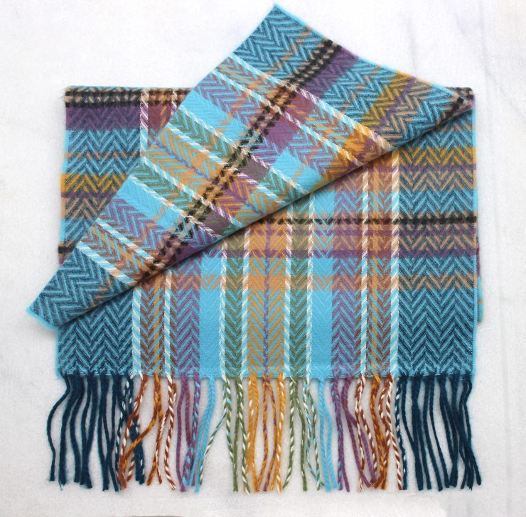A photo of the Multi-Colored Plaid Cashmere Feel Scarf product