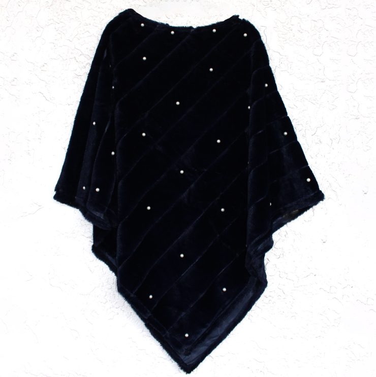A photo of the Pearl Studded Poncho product