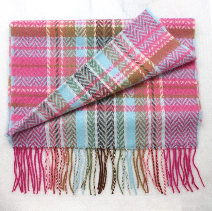 A photo of the Pink Chevron Plaid Cashmere Feel Scarf product