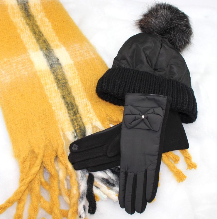 A photo of the Proper Bow Gloves product