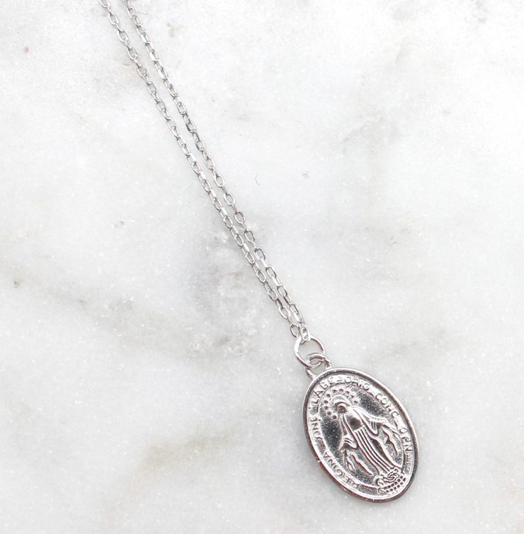 A photo of the Mary Medallion Necklace product