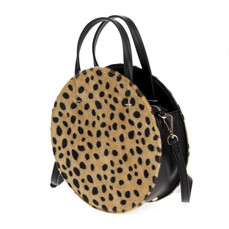 A photo of the Round About Way Handbag product